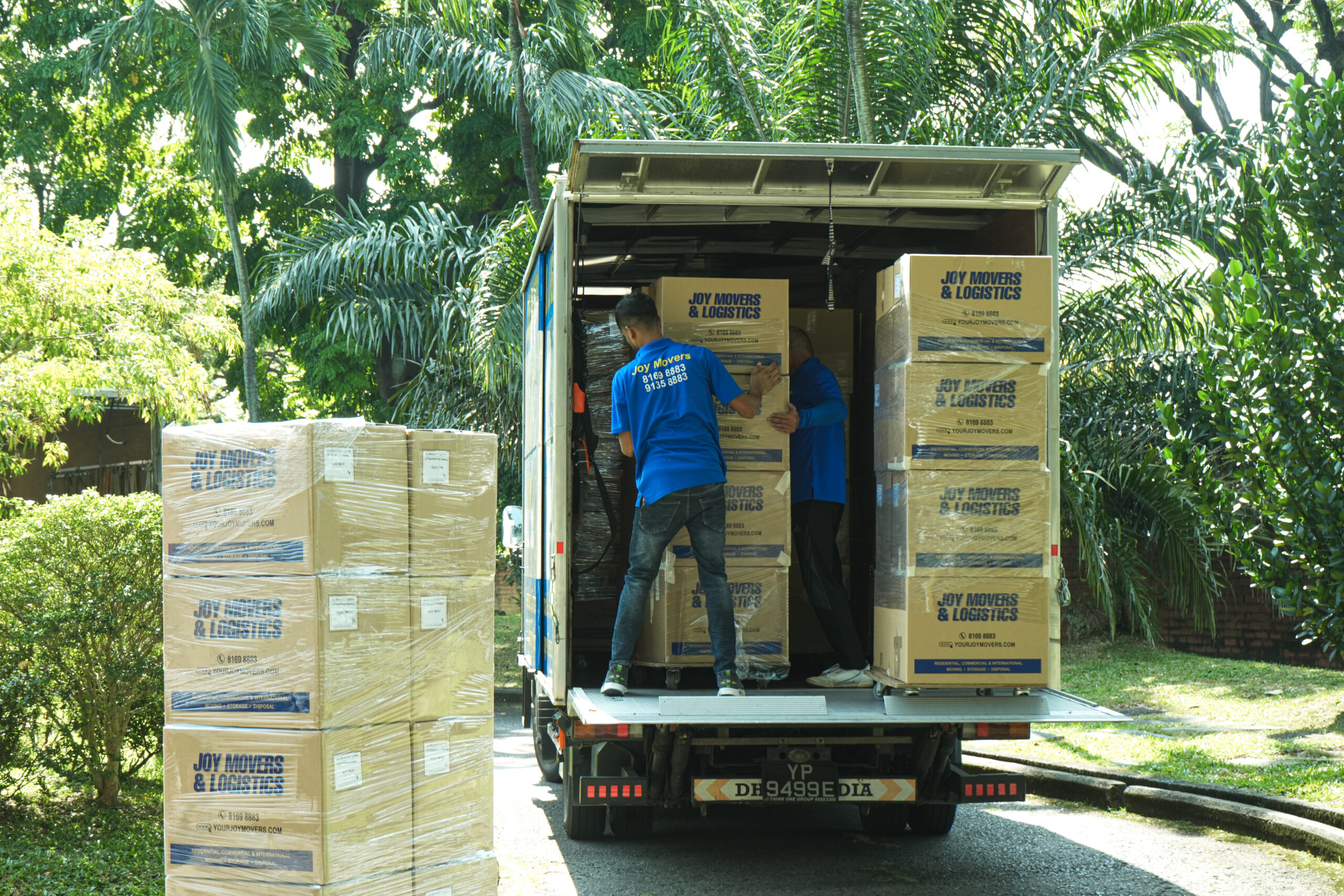 loading storage boxes onto moving truck